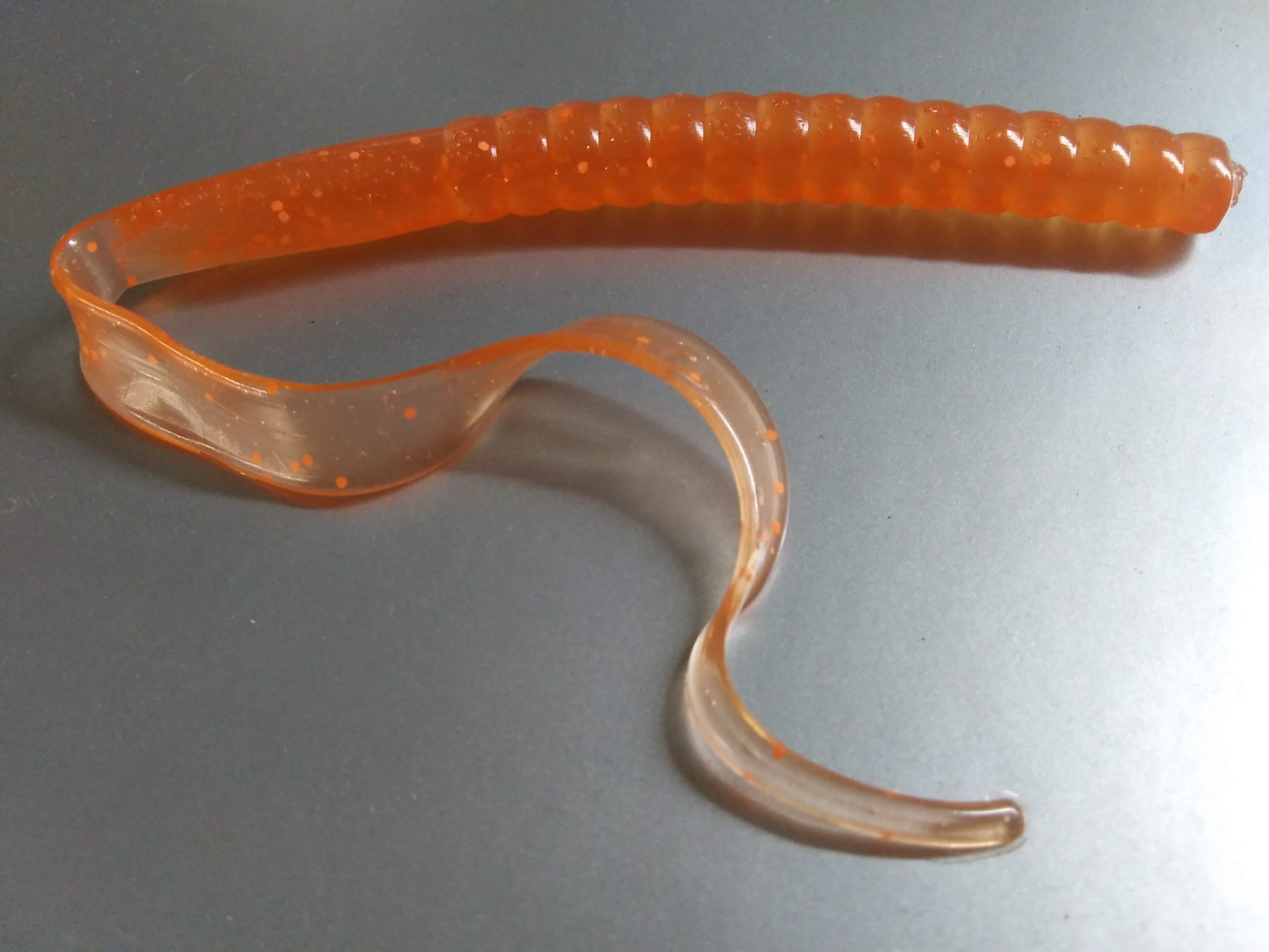 10 Inch ribbon tail soft bait with a flat back side. We call this The  Culler - Get Hooked Magic Baits