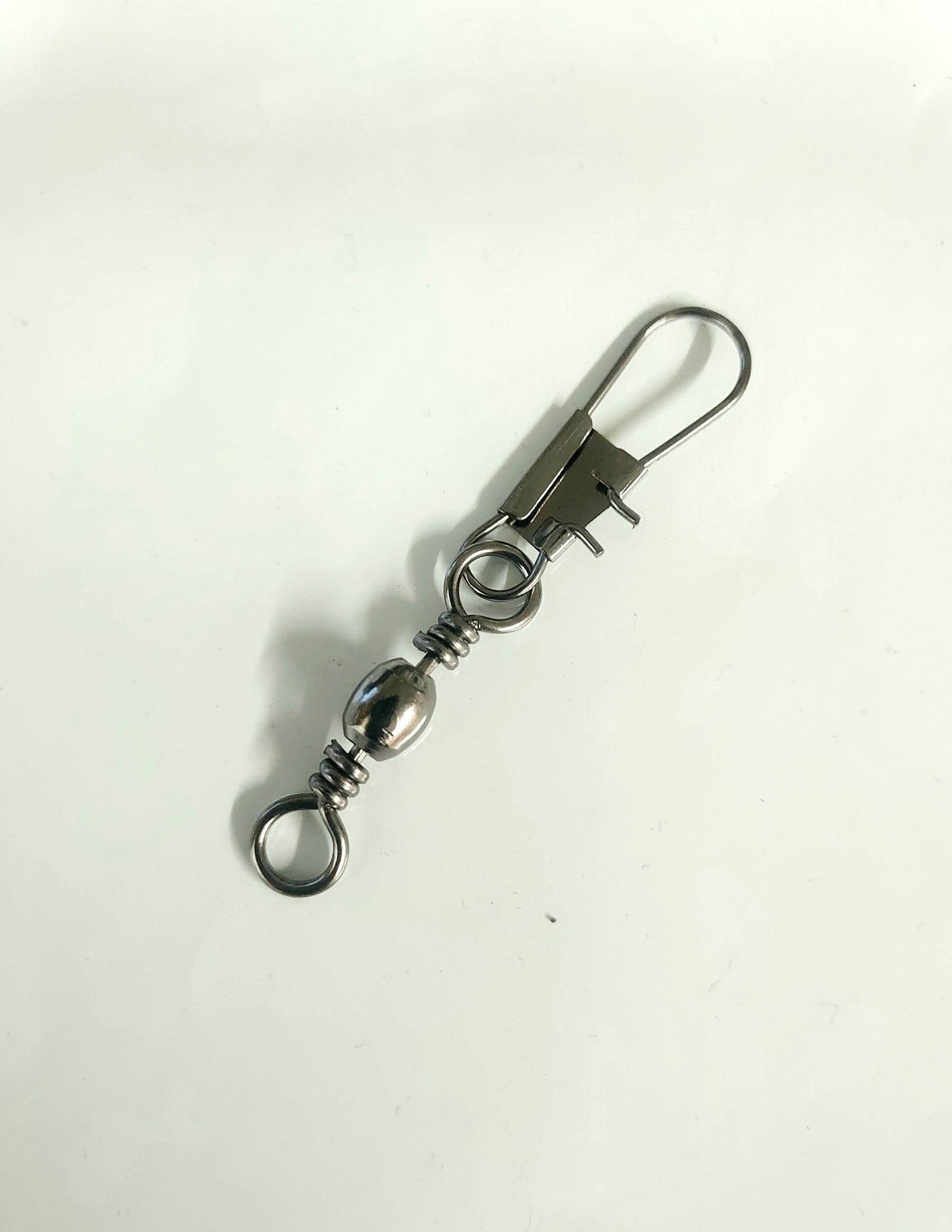 Ball bearing snap swivel. Helps save you from line twist. - Get Hooked  Magic Baits