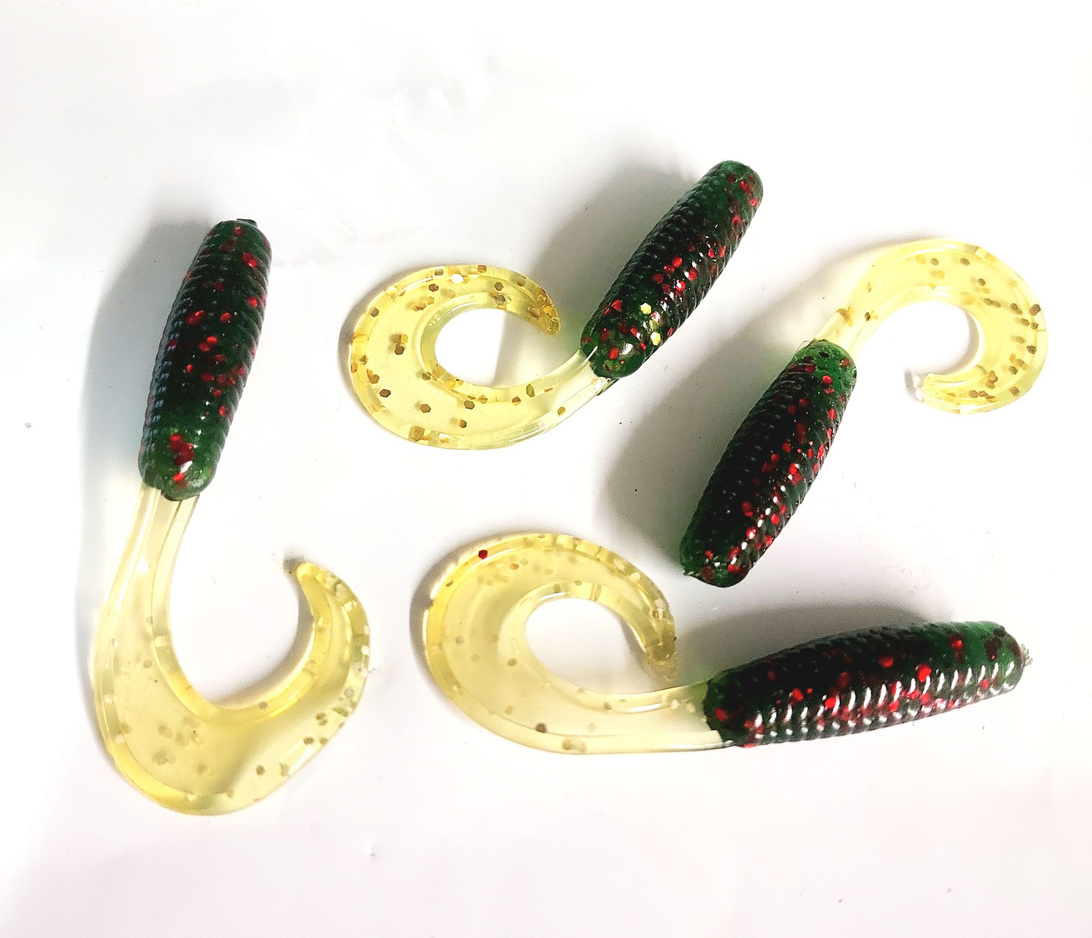 Crappie Grub soft plastics, 2 inch grub watermelon red with the Chartreuse  tail. We call this bait lucky charm - Get Hooked Magic Baits
